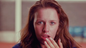 Movie still from “Rain Phoenix - Immolate” (2019), directed by Gus Van Sant – Extreme Close Up shot, Low angle