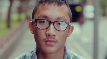 Movie still from “Rain Phoenix - Immolate” (2019), directed by Gus Van Sant – Close Up shot, Low angle