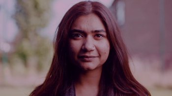 Movie still from “Rain Phoenix - Immolate” (2019), directed by Gus Van Sant – Close Up shot, Low angle