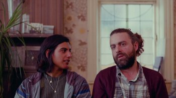 Movie still from “Rain Phoenix - Immolate” (2019), directed by Gus Van Sant – Medium shot, Over the shoulder angle