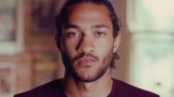 Movie still from “Rain Phoenix - Immolate” (2019), directed by Gus Van Sant – Close Up shot, Low angle