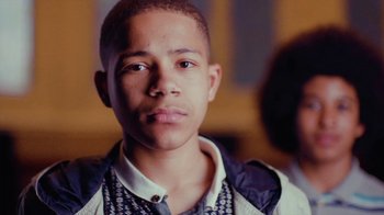 Movie still from “Rain Phoenix - Immolate” (2019), directed by Gus Van Sant – Close Up shot, Low angle