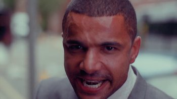 Movie still from “Rain Phoenix - Immolate” (2019), directed by Gus Van Sant – Close Up shot, Low angle