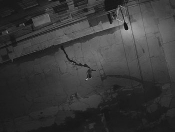 Movie still from “MorMor - Some Place Else” (2019), directed by rubberband. – Extreme Wide shot, Overhead angle