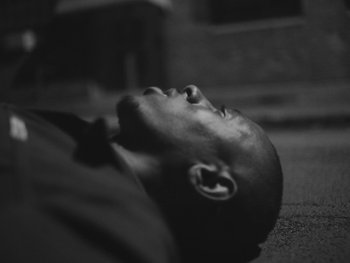 Movie still from “MorMor - Some Place Else” (2019), directed by rubberband. – Extreme Close Up shot, Overhead angle