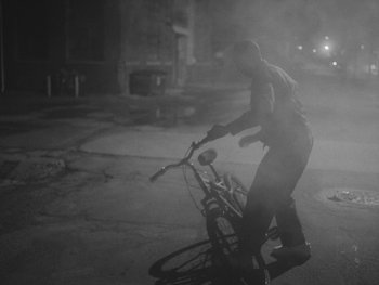 Movie still from “MorMor - Some Place Else” (2019), directed by rubberband. – Wide shot, Low angle