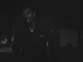 Movie still from “MorMor - Some Place Else” (2019), directed by rubberband. – Close Up shot, Low angle