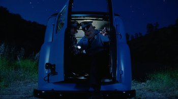 Movie still from “A$AP Rocky - Babushka Boi” (2019), directed by Nadia Lee Cohen – Wide shot, Low angle