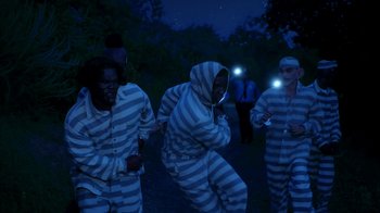 Movie still from “A$AP Rocky - Babushka Boi” (2019), directed by Nadia Lee Cohen – Wide shot, High angle