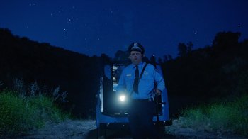 Movie still from “A$AP Rocky - Babushka Boi” (2019), directed by Nadia Lee Cohen – Wide shot, Low angle