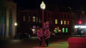 Movie still from “A$AP Rocky - Babushka Boi” (2019), directed by Nadia Lee Cohen – Wide shot, Low angle