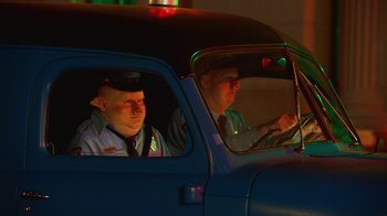 Movie still from “A$AP Rocky - Babushka Boi” (2019), directed by Nadia Lee Cohen – Medium shot, Low angle