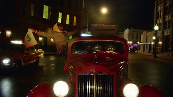 Movie still from “A$AP Rocky - Babushka Boi” (2019), directed by Nadia Lee Cohen – Wide shot, Low angle