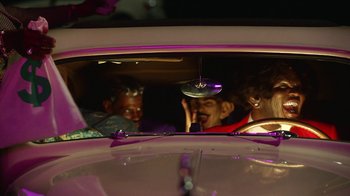 Movie still from “A$AP Rocky - Babushka Boi” (2019), directed by Nadia Lee Cohen – Medium shot, Over the shoulder angle