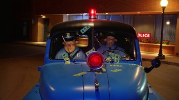 Movie still from “A$AP Rocky - Babushka Boi” (2019), directed by Nadia Lee Cohen – Wide shot, Low angle