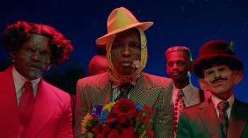 Movie still from “A$AP Rocky - Babushka Boi” (2019), directed by Nadia Lee Cohen – Close Up shot, Low angle