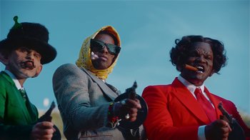 Movie still from “A$AP Rocky - Babushka Boi” (2019), directed by Nadia Lee Cohen – Medium shot, Low angle