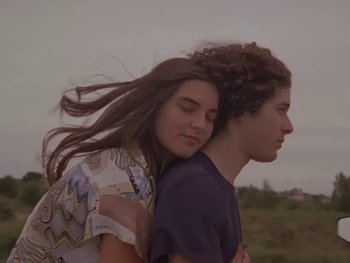 Movie still from “Sam Fender - Will We Talk?” (2019), directed by Vincent Haycock – Medium shot, Low angle