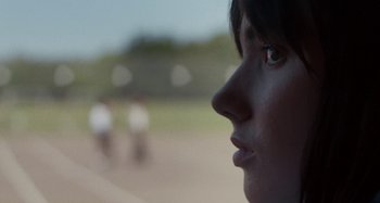 Movie still from “Stereophonics - Fly Like An Eagle” (2019), directed by Charlotte Regan – Extreme Close Up shot, Over the shoulder angle