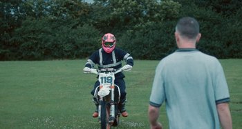 Movie still from “Stereophonics - Fly Like An Eagle” (2019), directed by Charlotte Regan – Wide shot, Over the shoulder angle