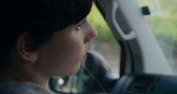 Movie still from “Stereophonics - Fly Like An Eagle” (2019), directed by Charlotte Regan – Extreme Close Up shot, Over the shoulder angle