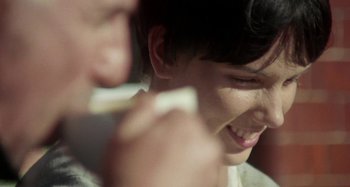 Movie still from “Stereophonics - Fly Like An Eagle” (2019), directed by Charlotte Regan – Extreme Close Up shot, Over the shoulder angle