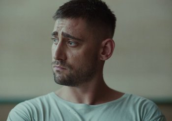 Movie still from “Elderbrook & Rudimental - Something About You” (2019), directed by Luke Davies – Close Up shot, Low angle