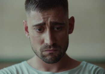 Movie still from “Elderbrook & Rudimental - Something About You” (2019), directed by Luke Davies – Close Up shot, Low angle