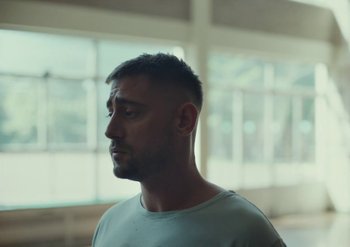 Movie still from “Elderbrook & Rudimental - Something About You” (2019), directed by Luke Davies – Close Up shot, Low angle