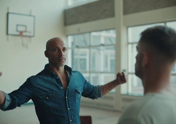 Movie still from “Elderbrook & Rudimental - Something About You” (2019), directed by Luke Davies – Medium shot, Over the shoulder angle