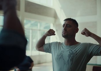 Movie still from “Elderbrook & Rudimental - Something About You” (2019), directed by Luke Davies – Medium shot, Low angle