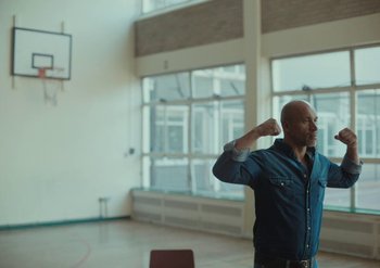 Movie still from “Elderbrook & Rudimental - Something About You” (2019), directed by Luke Davies – Medium shot, Low angle