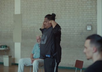 Movie still from “Elderbrook & Rudimental - Something About You” (2019), directed by Luke Davies – Medium shot, Over the shoulder angle