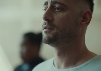 Movie still from “Elderbrook & Rudimental - Something About You” (2019), directed by Luke Davies – Close Up shot, Low angle