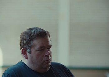 Movie still from “Elderbrook & Rudimental - Something About You” (2019), directed by Luke Davies – Close Up shot, Low angle