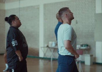Movie still from “Elderbrook & Rudimental - Something About You” (2019), directed by Luke Davies – Medium shot, Over the shoulder angle
