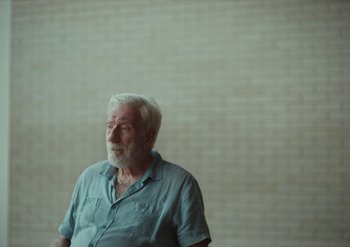 Movie still from “Elderbrook & Rudimental - Something About You” (2019), directed by Luke Davies – Medium shot, Low angle