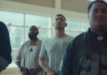 Movie still from “Elderbrook & Rudimental - Something About You” (2019), directed by Luke Davies – Medium shot, Low angle