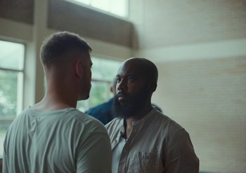 Movie still from “Elderbrook & Rudimental - Something About You” (2019), directed by Luke Davies – Close Up shot, Over the shoulder angle