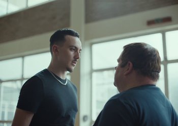 Movie still from “Elderbrook & Rudimental - Something About You” (2019), directed by Luke Davies – Medium shot, Low angle