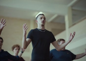 Movie still from “Elderbrook & Rudimental - Something About You” (2019), directed by Luke Davies – Medium shot, Low angle