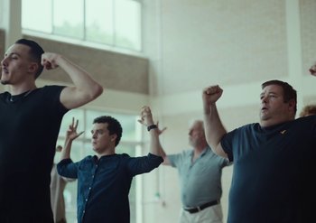 Movie still from “Elderbrook & Rudimental - Something About You” (2019), directed by Luke Davies – Medium shot, Low angle