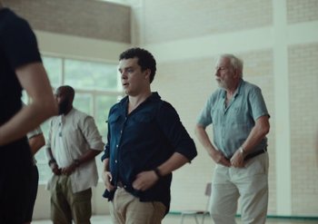 Movie still from “Elderbrook & Rudimental - Something About You” (2019), directed by Luke Davies – Medium shot, Low angle