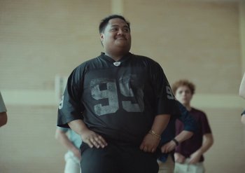 Movie still from “Elderbrook & Rudimental - Something About You” (2019), directed by Luke Davies – Medium shot, Low angle