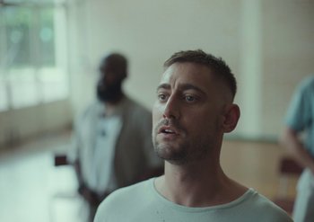 Movie still from “Elderbrook & Rudimental - Something About You” (2019), directed by Luke Davies – Close Up shot, Low angle