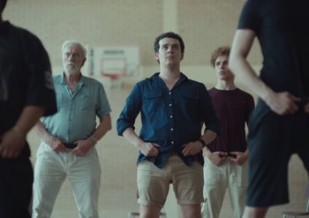 Movie still from “Elderbrook & Rudimental - Something About You” (2019), directed by Luke Davies – Medium shot, Low angle