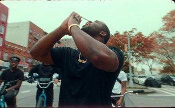 Movie still from “A$AP Ferg - Floor Seats” (2019), directed by Valentin Petit – Medium shot, Low angle