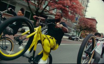 Movie still from “A$AP Ferg - Floor Seats” (2019), directed by Valentin Petit – Wide shot, Low angle