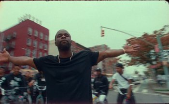 Movie still from “A$AP Ferg - Floor Seats” (2019), directed by Valentin Petit – Medium shot, Low angle