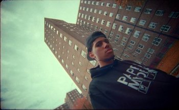 Movie still from “A$AP Ferg - Floor Seats” (2019), directed by Valentin Petit – Medium shot, Overhead angle